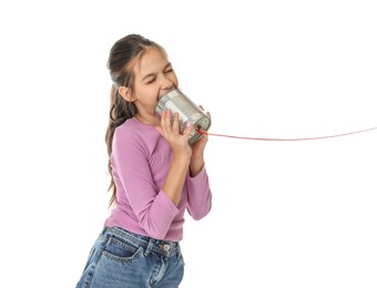 Photo of Girl using tin can telephone on white background