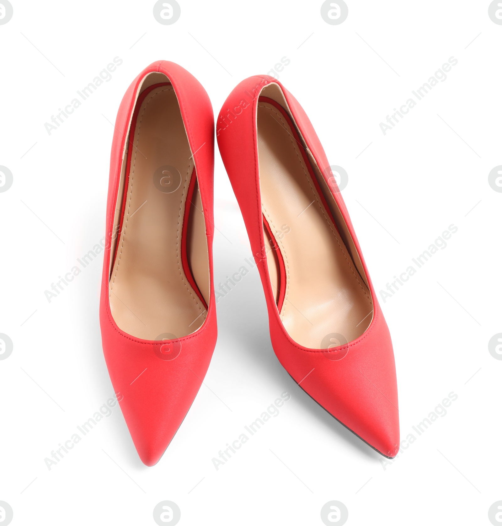 Photo of Pair of red high-heeled shoes isolated on white, top view