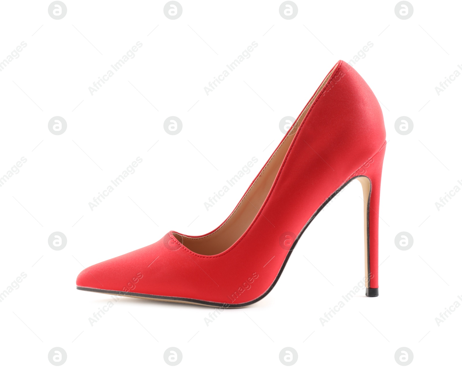 Photo of One red high-heeled shoe isolated on white