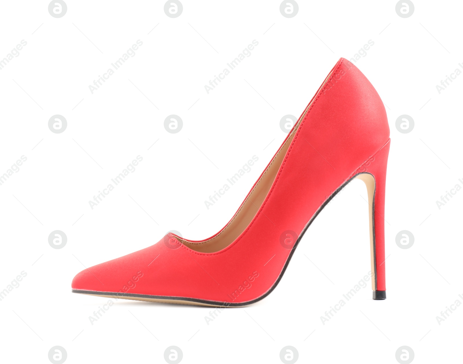 Photo of One red high-heeled shoe isolated on white