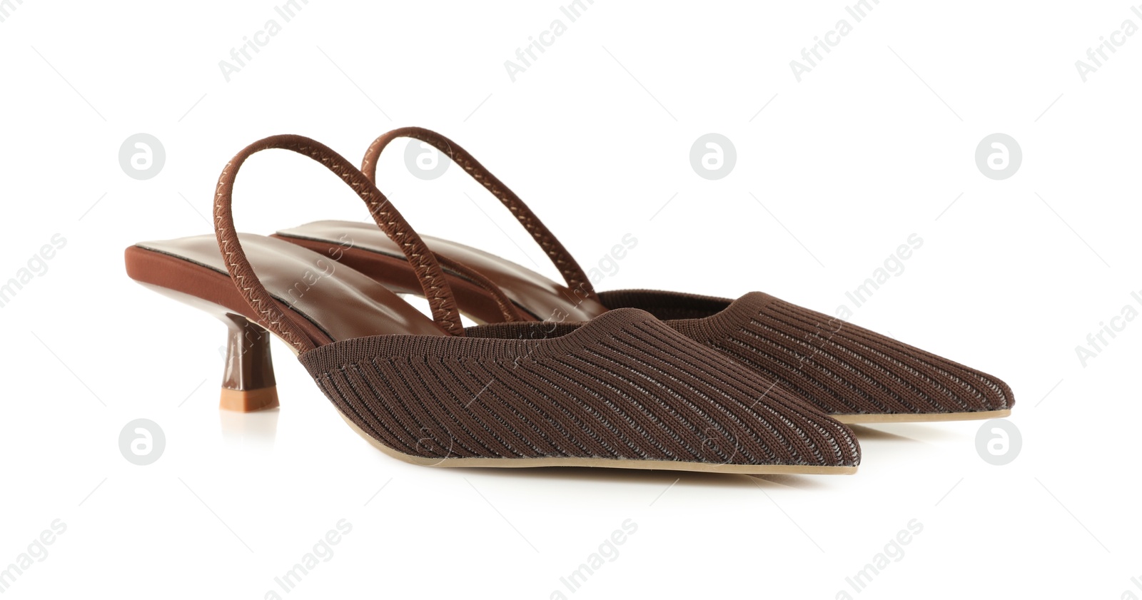 Photo of Pair of stylish brown women's shoes isolated on white