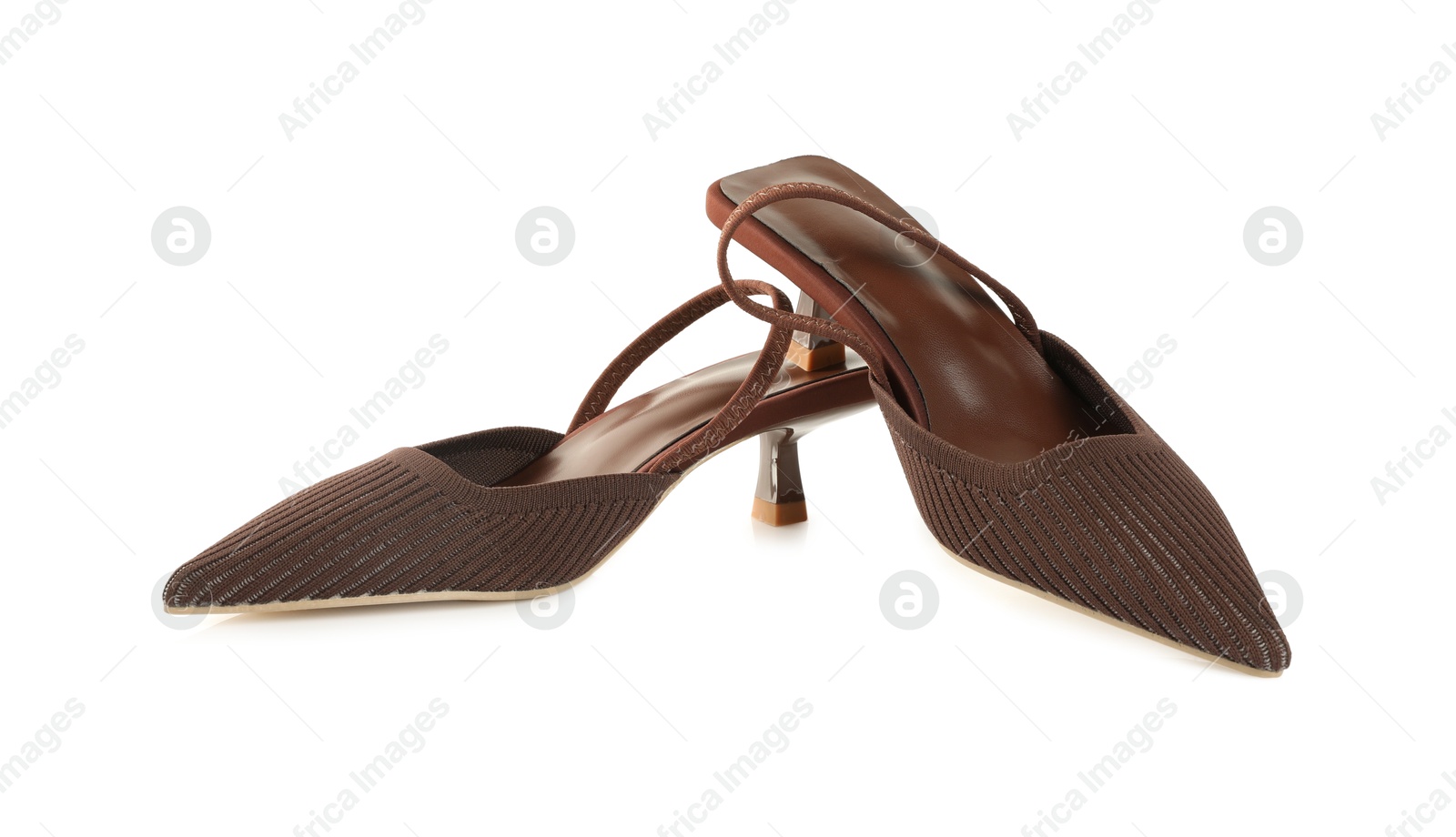 Photo of Pair of stylish brown women's shoes isolated on white