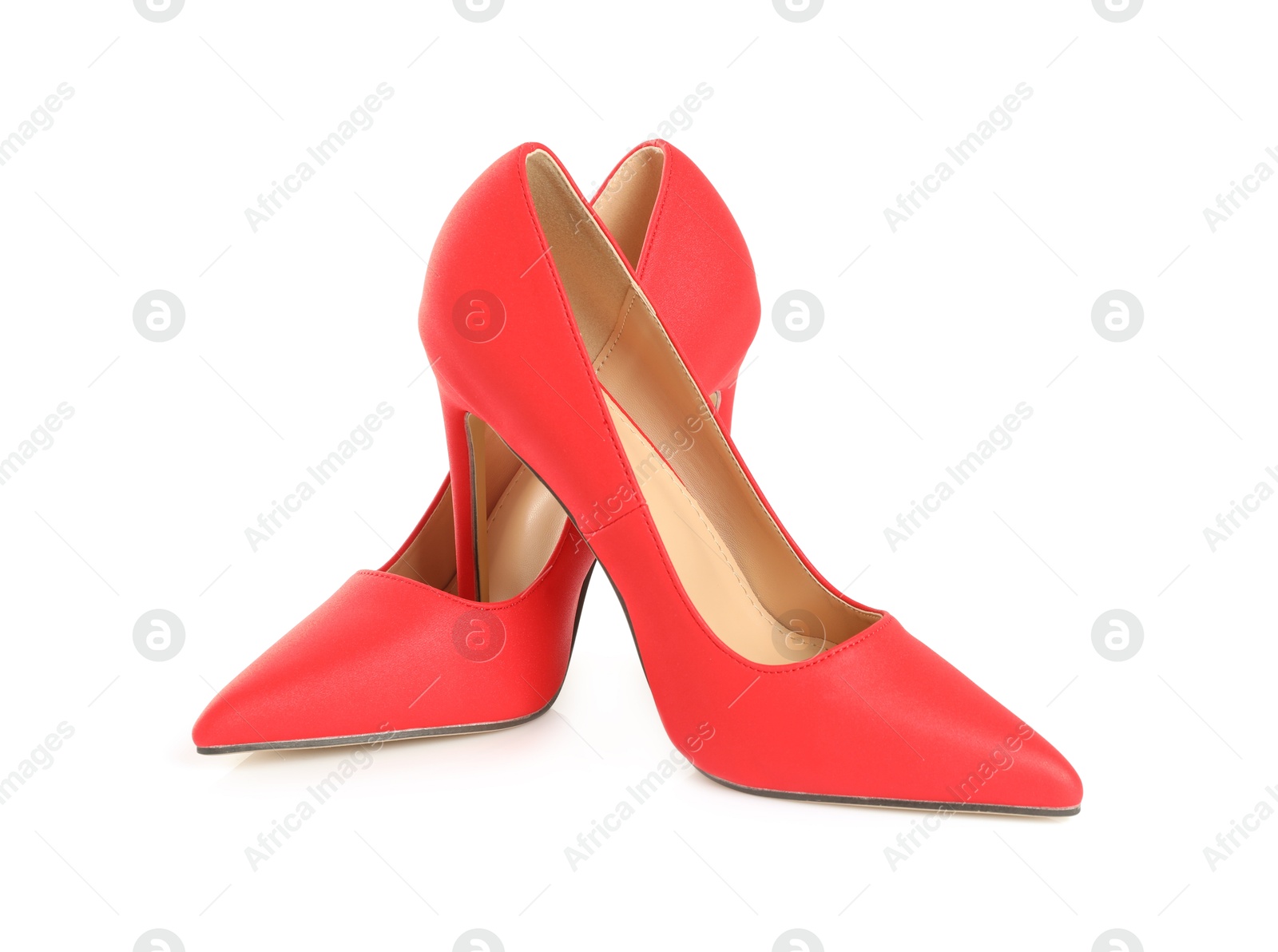 Photo of Pair of stylish red women's shoes isolated on white