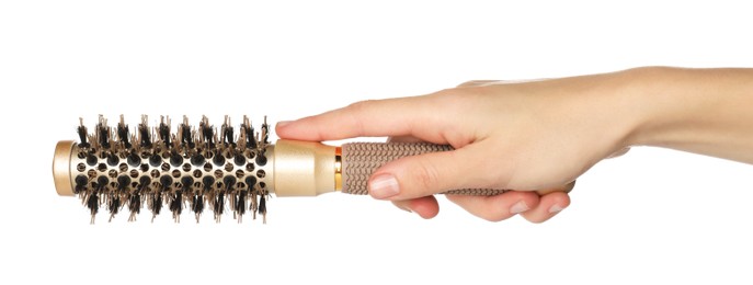 Photo of Woman with round golden hair brush on white background, closeup