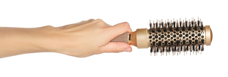 Photo of Woman with round golden hair brush on white background, closeup