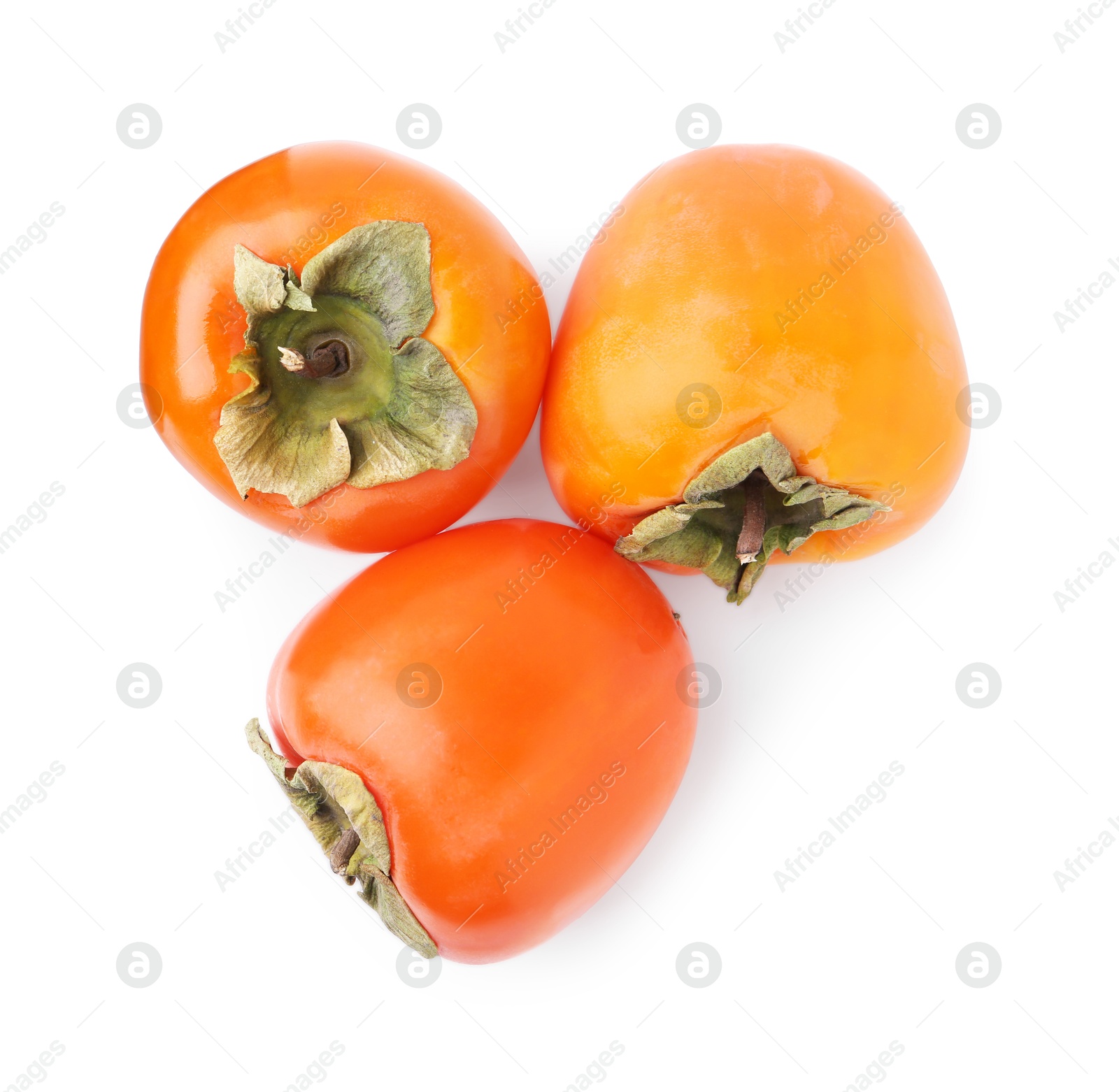 Photo of Delicious ripe juicy persimmons isolated on white