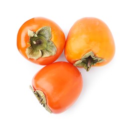 Photo of Delicious ripe juicy persimmons isolated on white