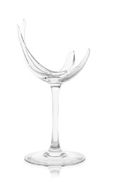 Photo of One broken wine glass isolated on white