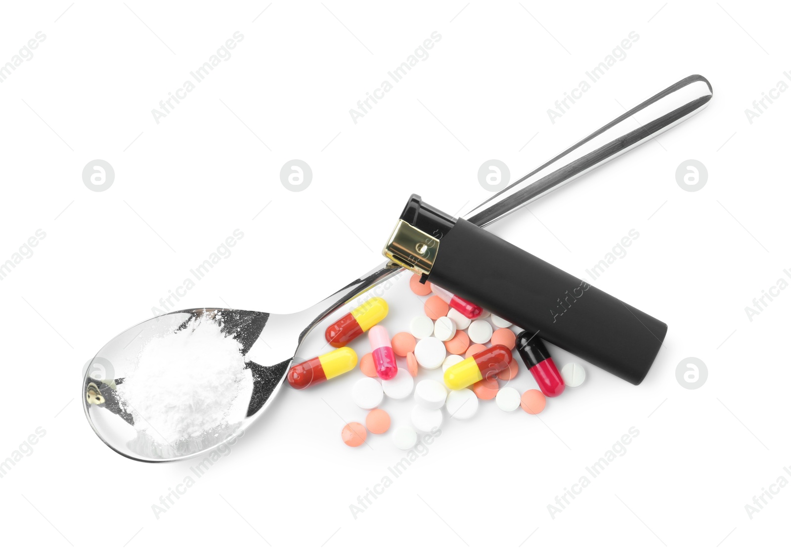 Photo of Drug addiction. Different pills, spoon with powder and cigarette lighter isolated on white, top view