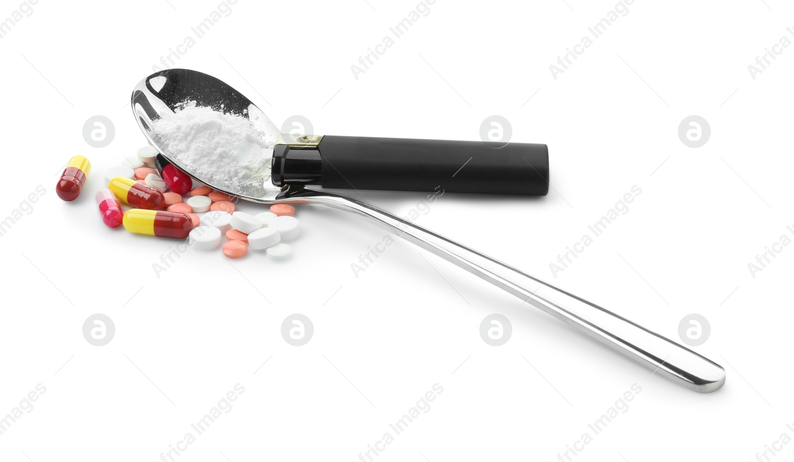 Photo of Drug addiction. Different pills, spoon with powder and cigarette lighter isolated on white