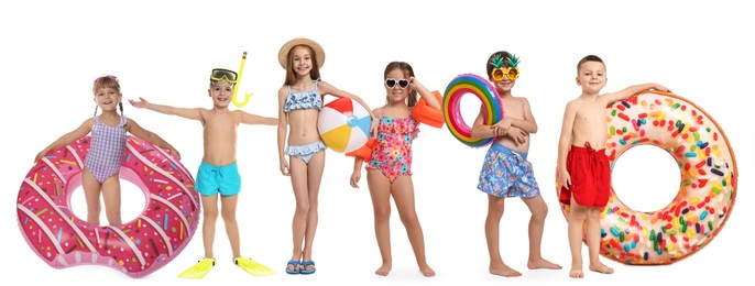 Image of Happy children in swimwear with beach items on white background