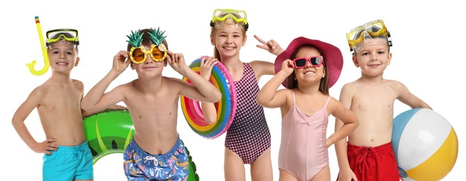 Image of Happy children in swimwear with beach items on white background