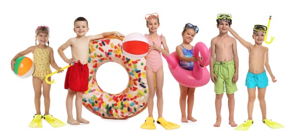 Image of Happy children in swimwear with beach items on white background