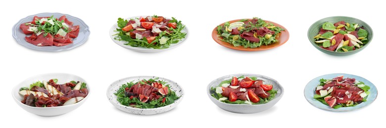 Image of Delicious salads with bresaola isolated on white, set