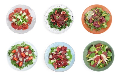 Image of Delicious salads with bresaola isolated on white, set. Top view