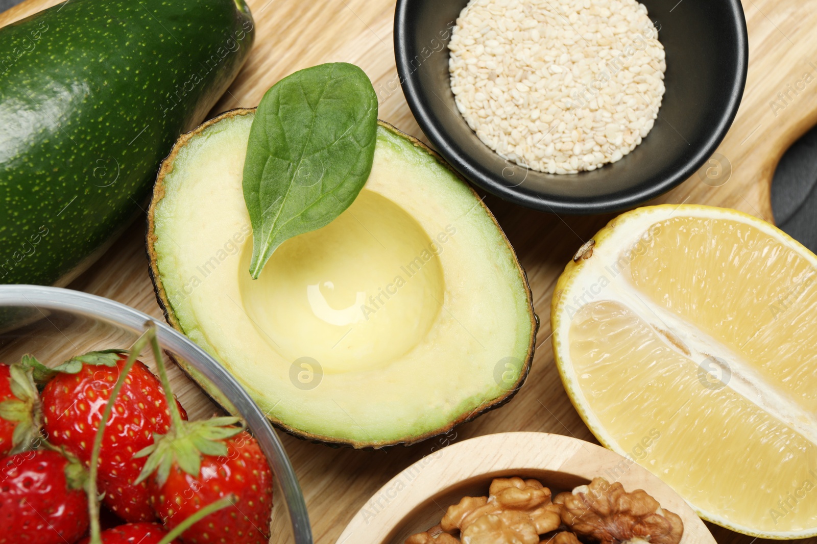 Photo of Different fresh products rich in dopamine on table, closeup