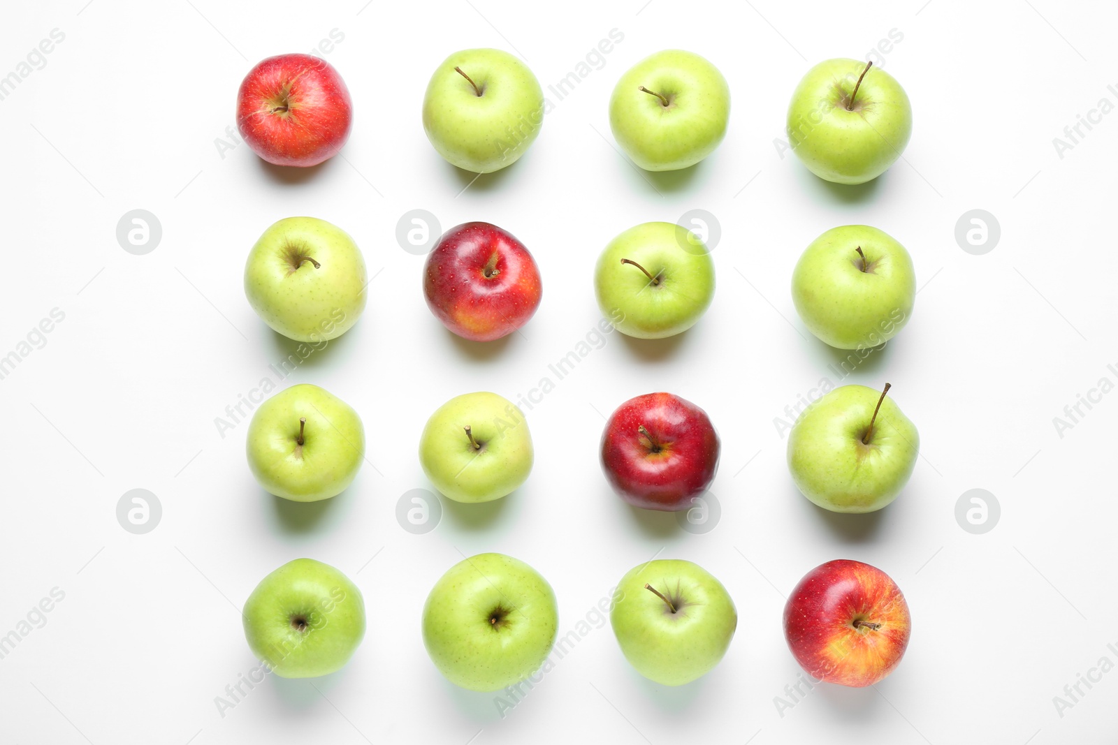 Photo of Red and green apples on white background, flat lay