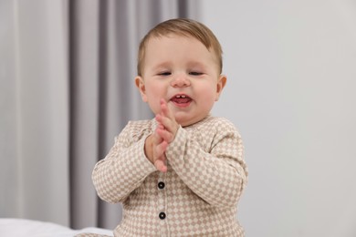 Photo of Portrait of sweet little baby at home