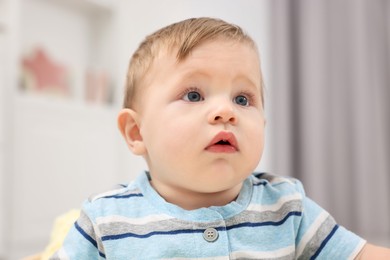 Photo of Portrait of adorable baby boy at home