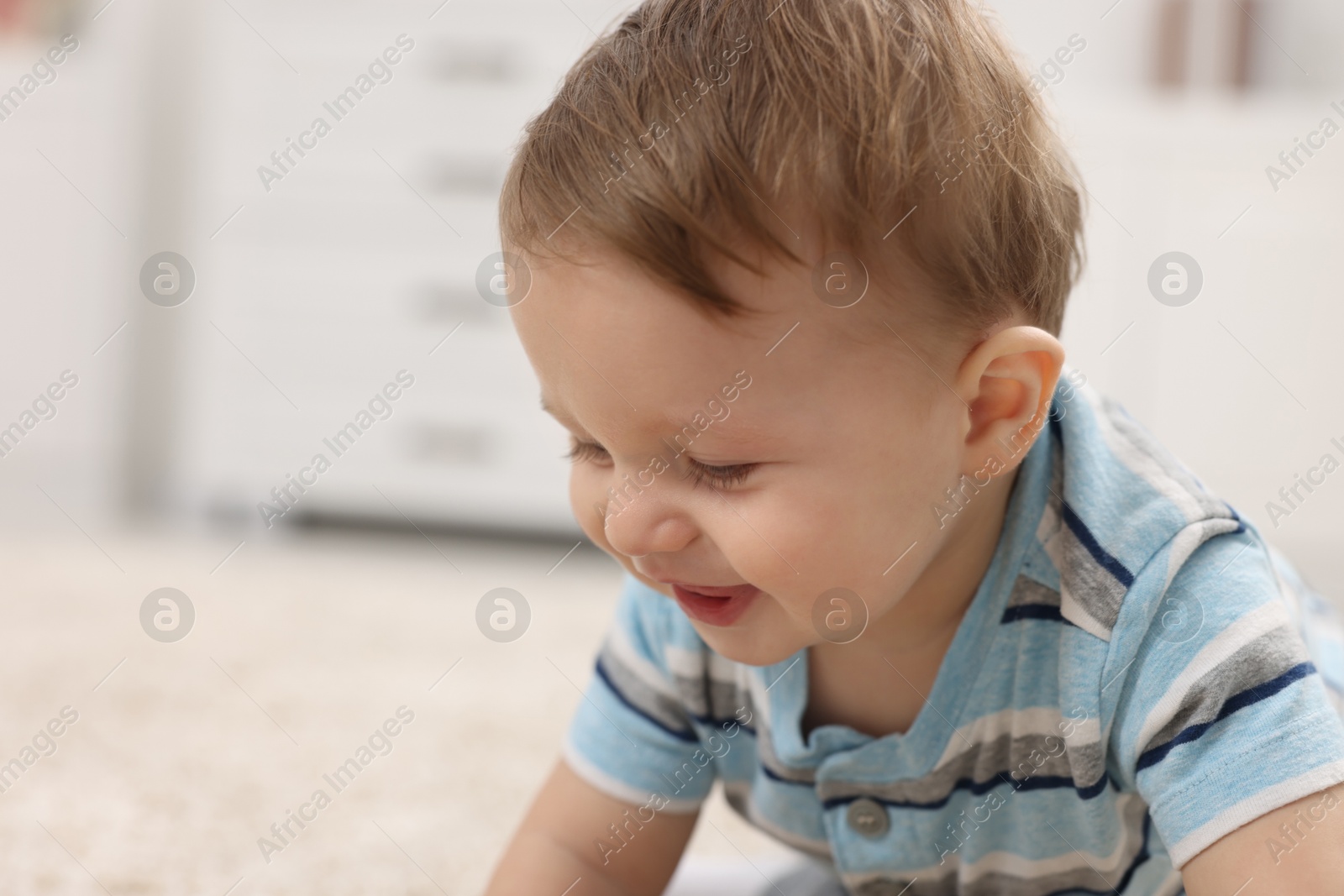 Photo of Portrait of adorable baby boy at home