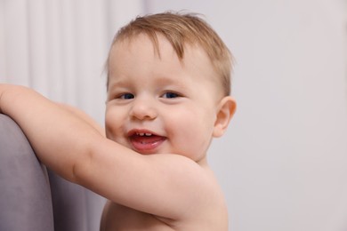 Photo of Portrait of cute little baby at home