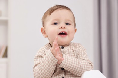 Photo of Portrait of sweet little baby at home