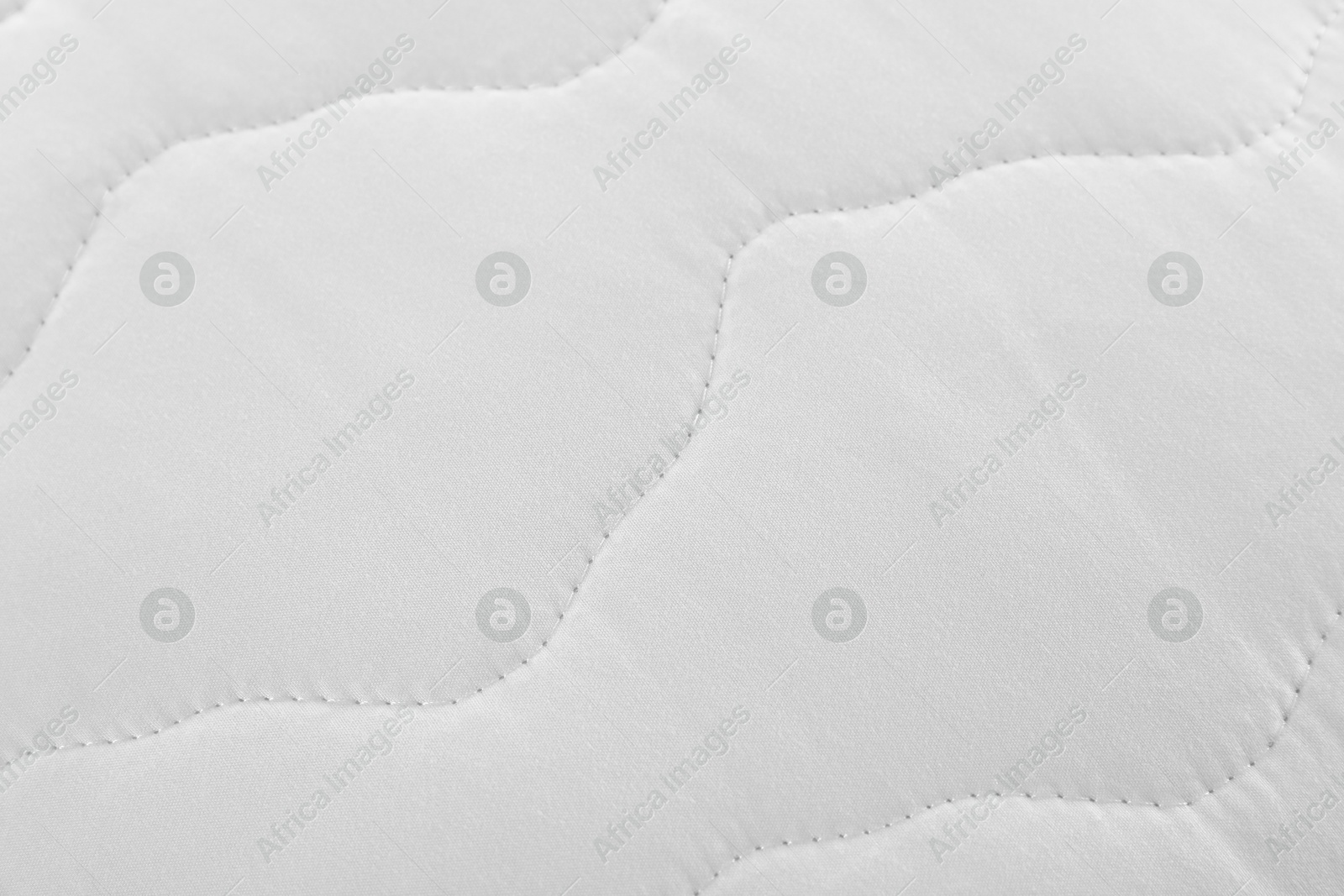 Photo of Texture of clean white pillowcase as background, top view