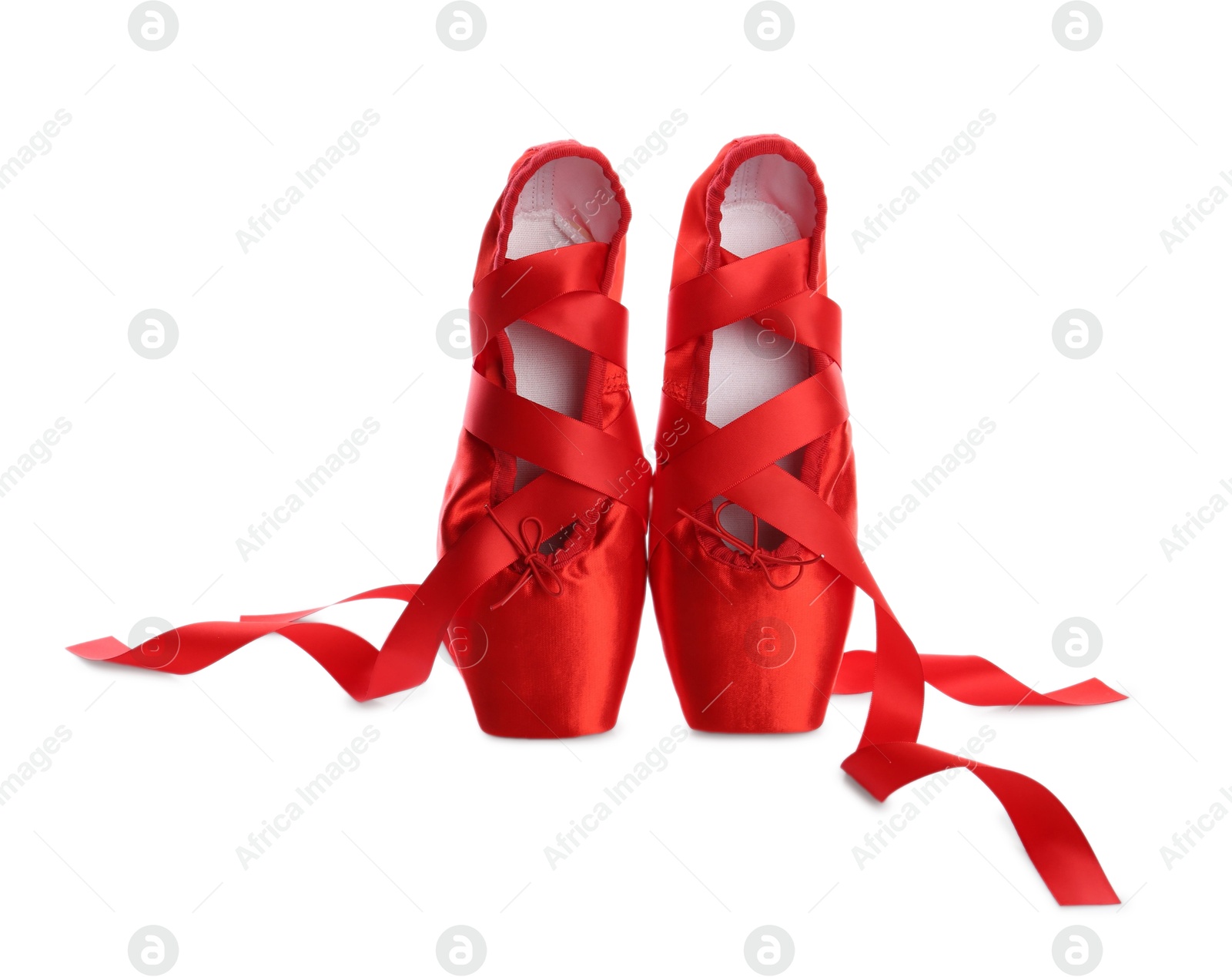 Photo of Pair of beautiful red pointe shoes isolated on white