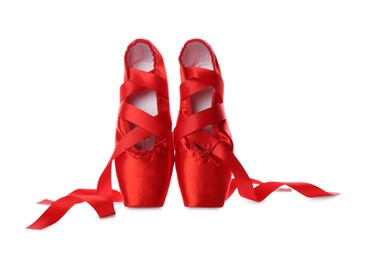 Photo of Pair of beautiful red pointe shoes isolated on white