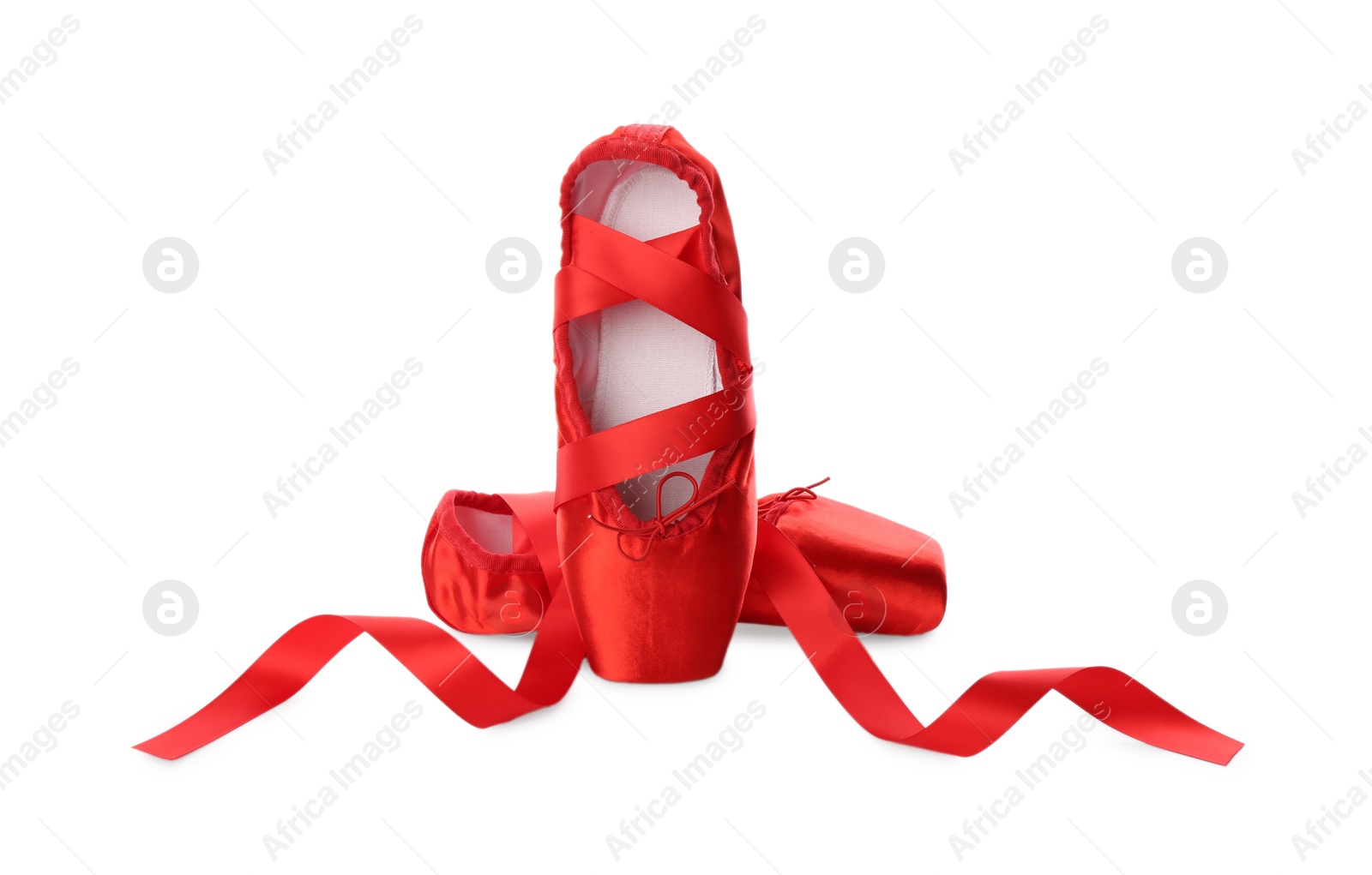 Photo of Pair of beautiful red pointe shoes isolated on white