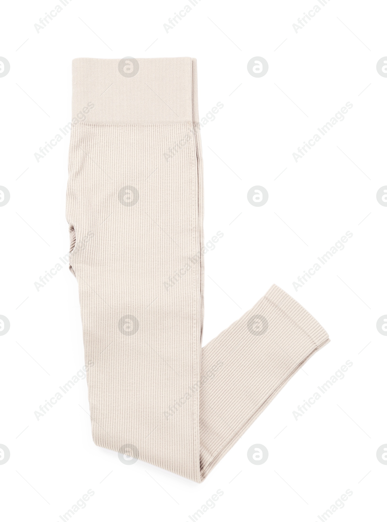 Photo of Beige women's leggings isolated on white, top view