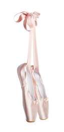 Photo of Pair of beautiful pointe shoes in air isolated on white