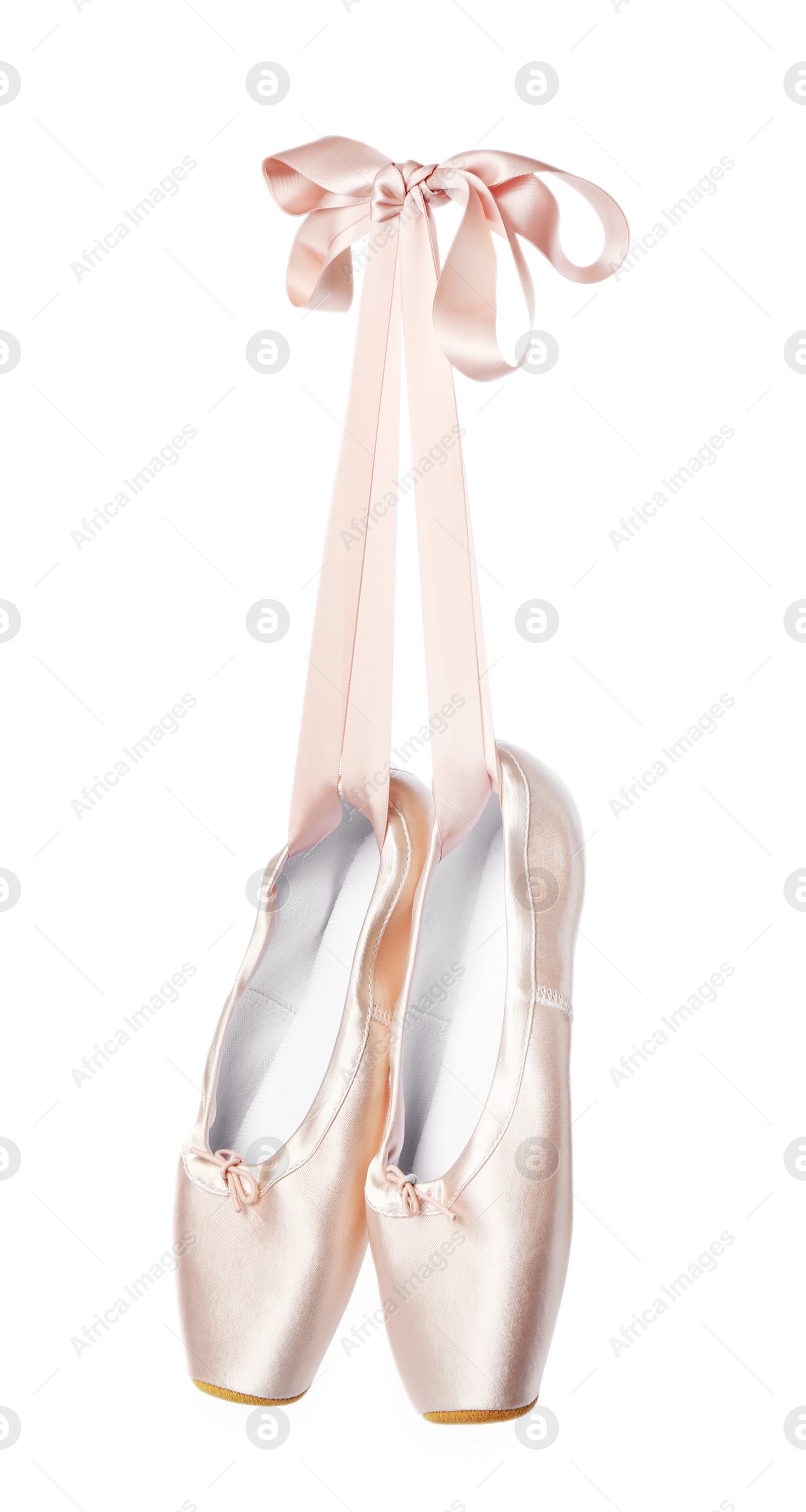 Photo of Pair of beautiful pointe shoes in air isolated on white