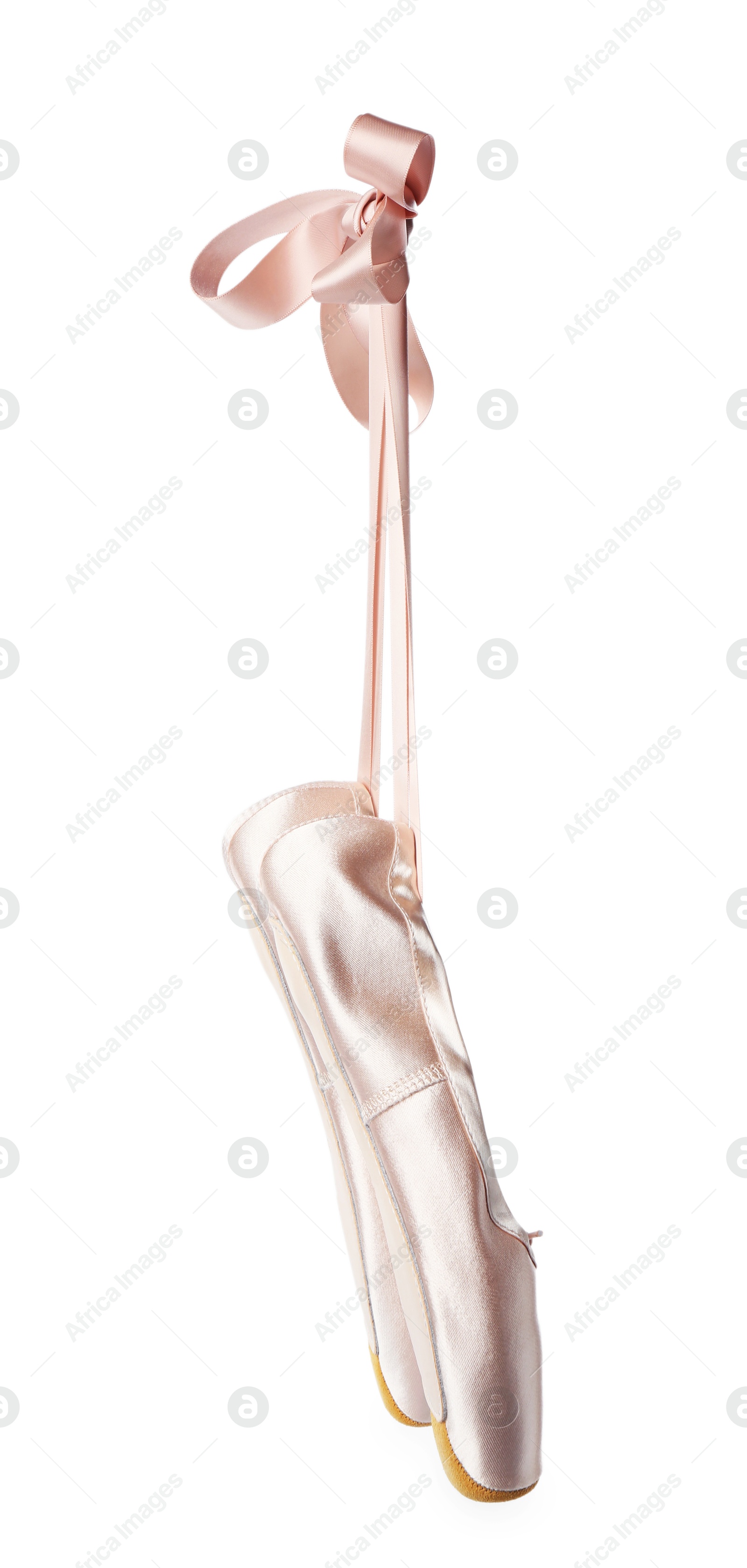 Photo of Pair of beautiful pointe shoes in air isolated on white