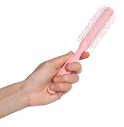 Photo of Woman with round pink hair brush on white background, closeup