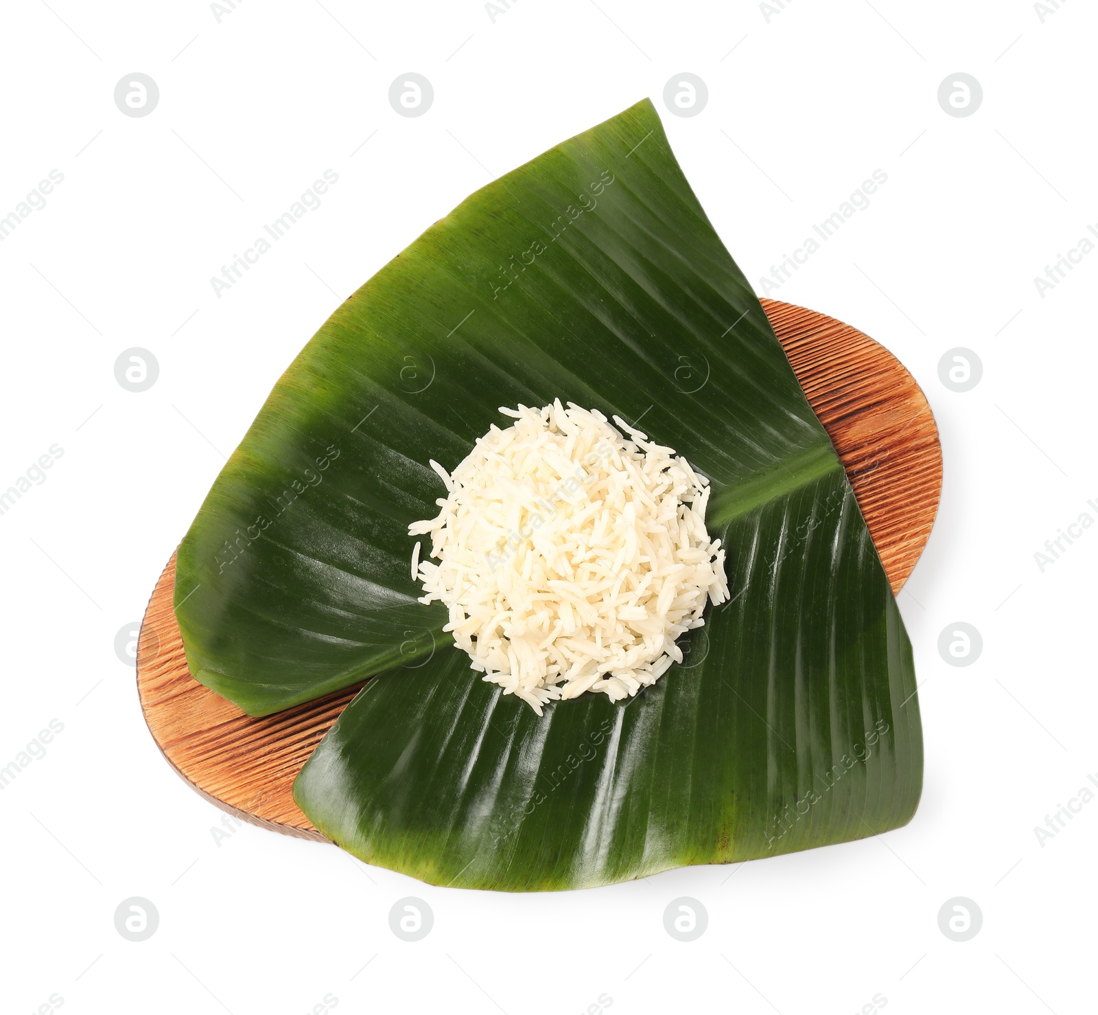 Photo of Cut banana leaf with pile of rice isolated on white, top view. Healthy eco serving