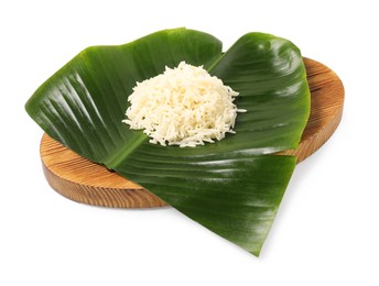 Photo of Cut banana leaf with pile of rice isolated on white. Healthy eco serving