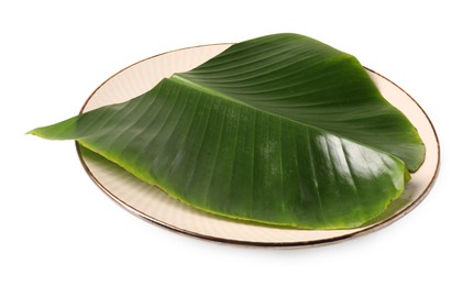 Photo of Plate with cut banana leaf isolated on white. Healthy eco serving