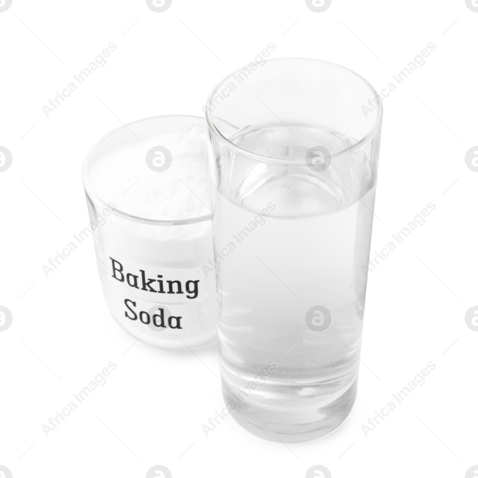 Photo of Glass of water and baking soda on white background