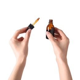 Photo of Woman with bottle of topical iodine on white background, closeup