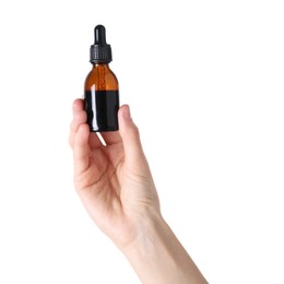 Photo of Woman with bottle of topical iodine on white background, closeup