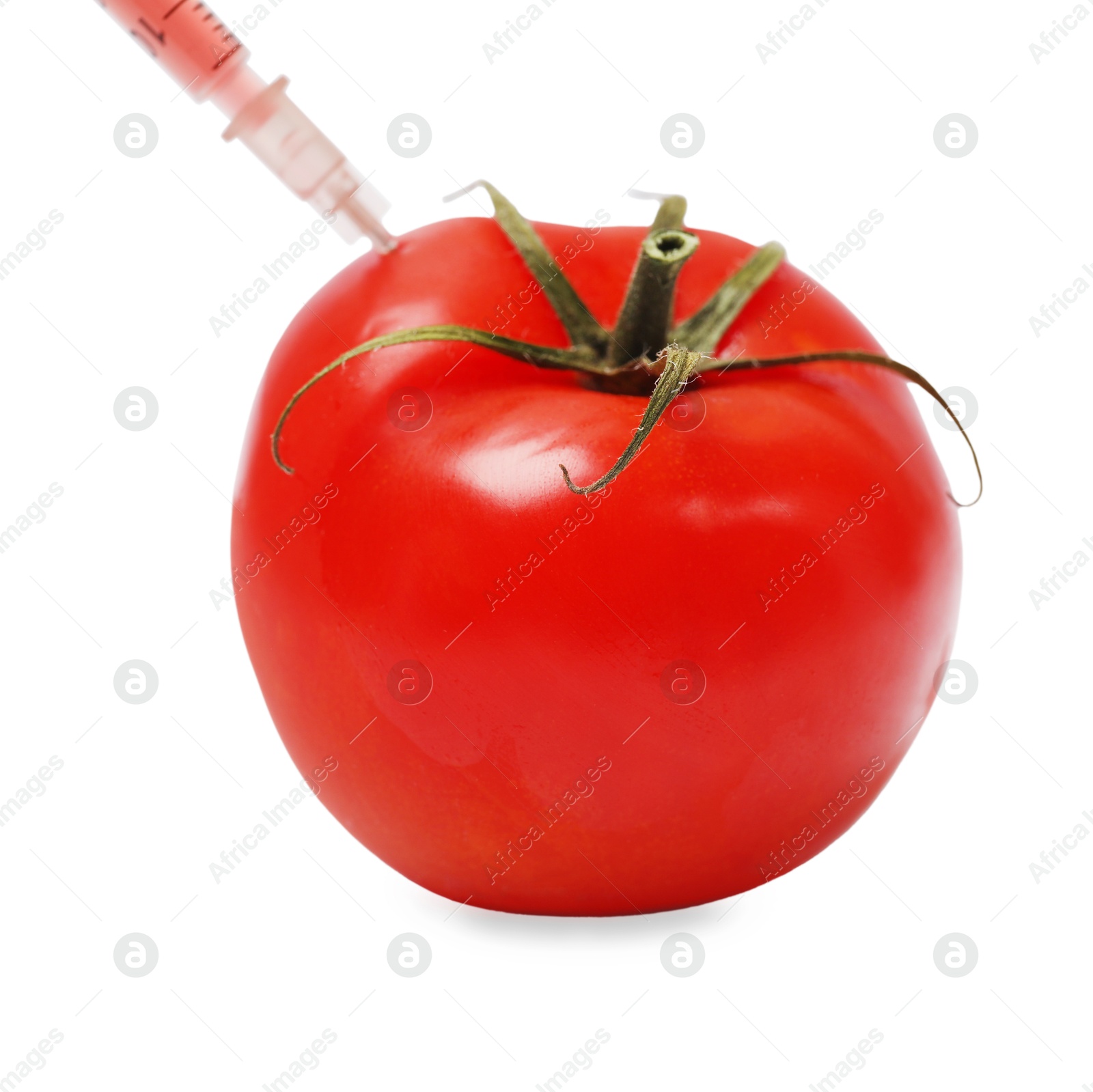 Photo of GMO concept. Fresh tomato and syringe isolated on white