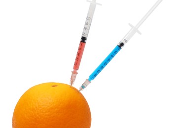 Photo of GMO concept. Fresh orange and syringes isolated on white