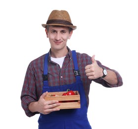 Photo of Farmer with vegetables showing thumbs up on white background