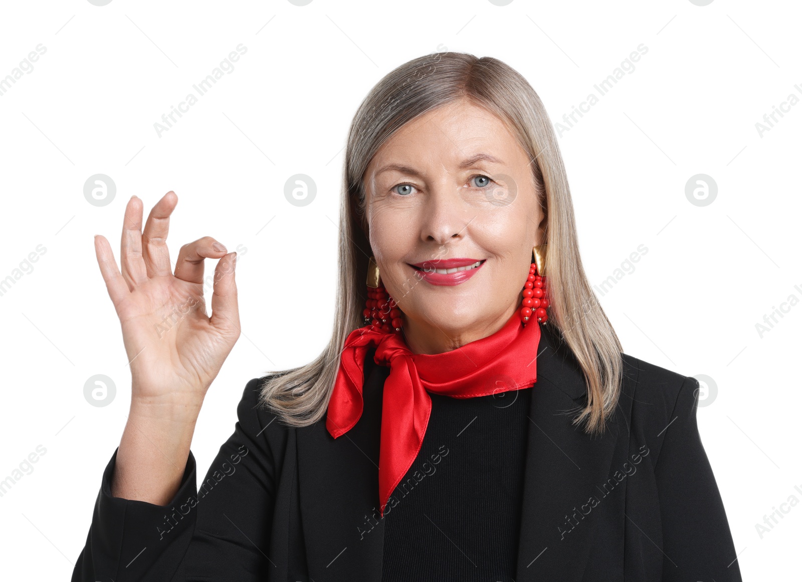 Photo of Senior woman showing okay gesture on white background