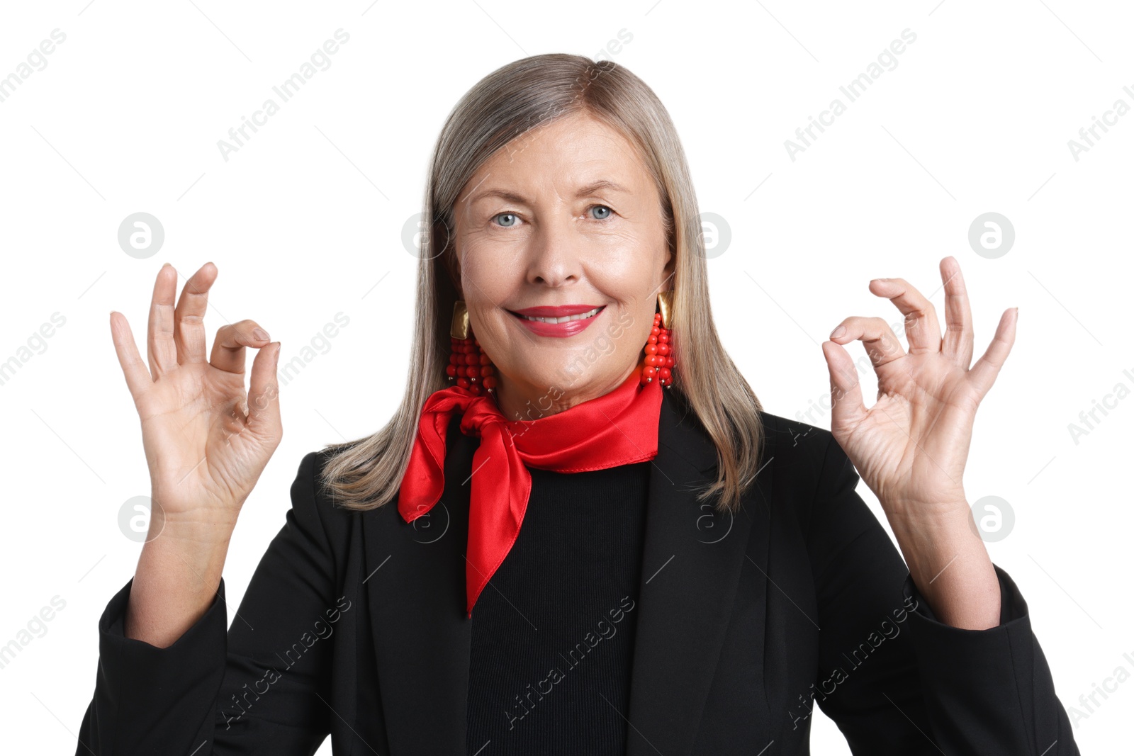 Photo of Senior woman showing okay gesture on white background