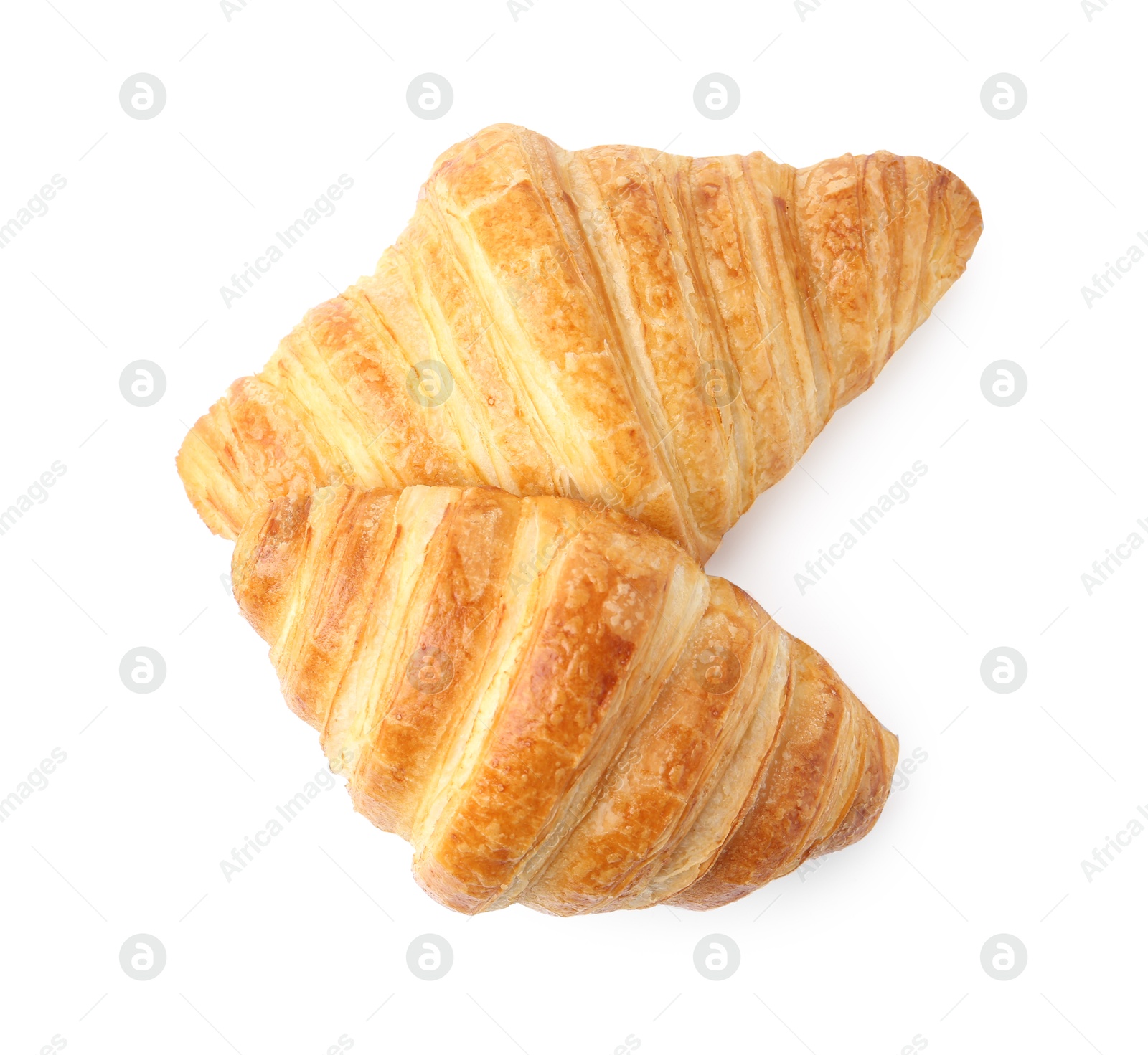 Photo of Tasty fresh croissants isolated on white, top view. Puff pastry