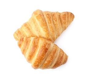 Photo of Tasty fresh croissants isolated on white, top view. Puff pastry