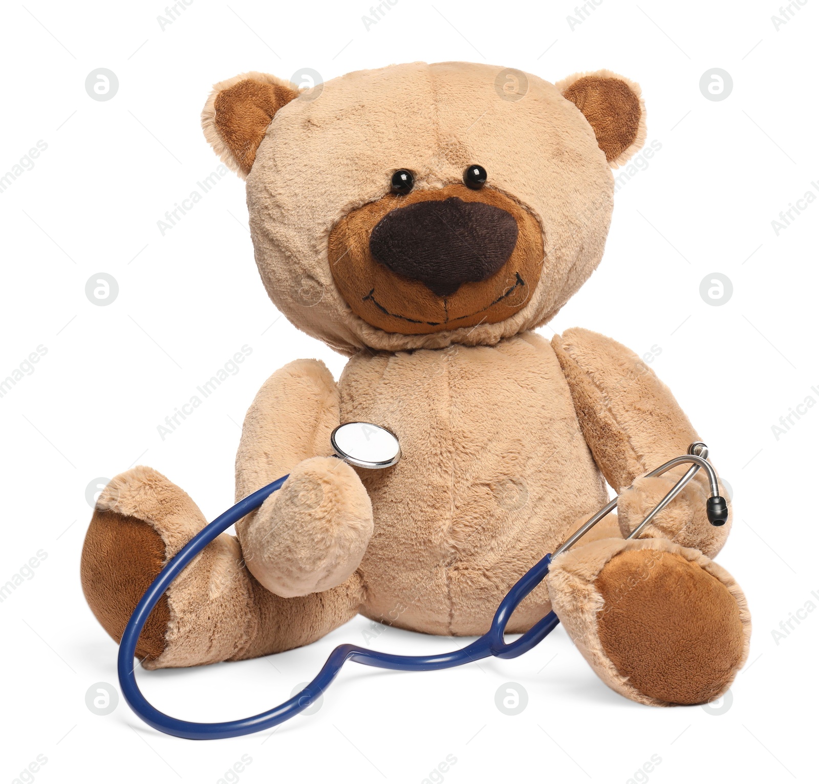 Photo of Pediatrics concept. Teddy bear with stethoscope isolated on white