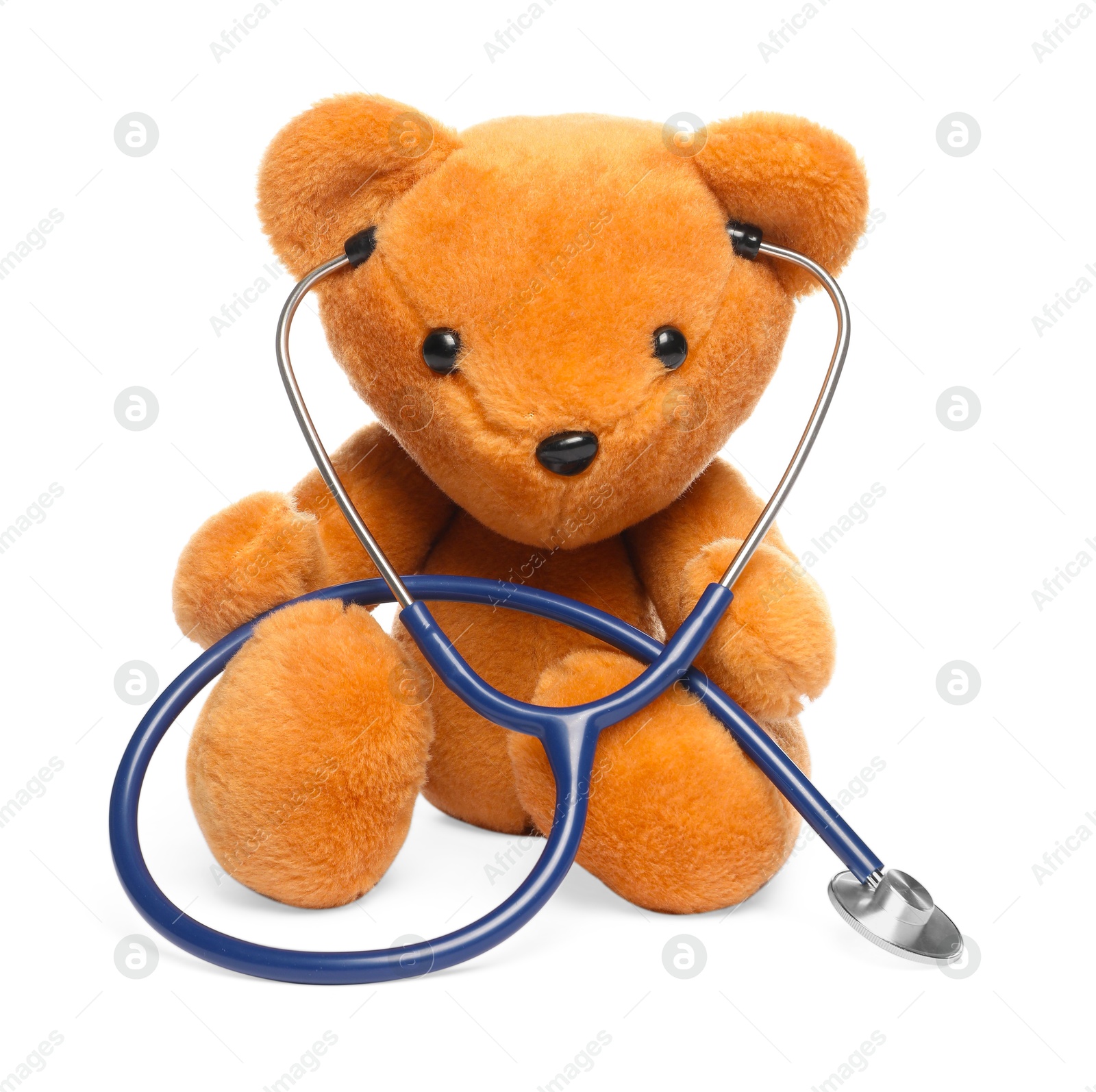 Photo of Pediatrics concept. Teddy bear with stethoscope isolated on white